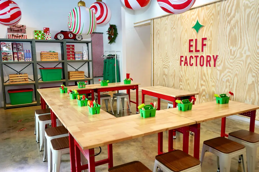 The Elf Factory workshop room with long tables ready for a group